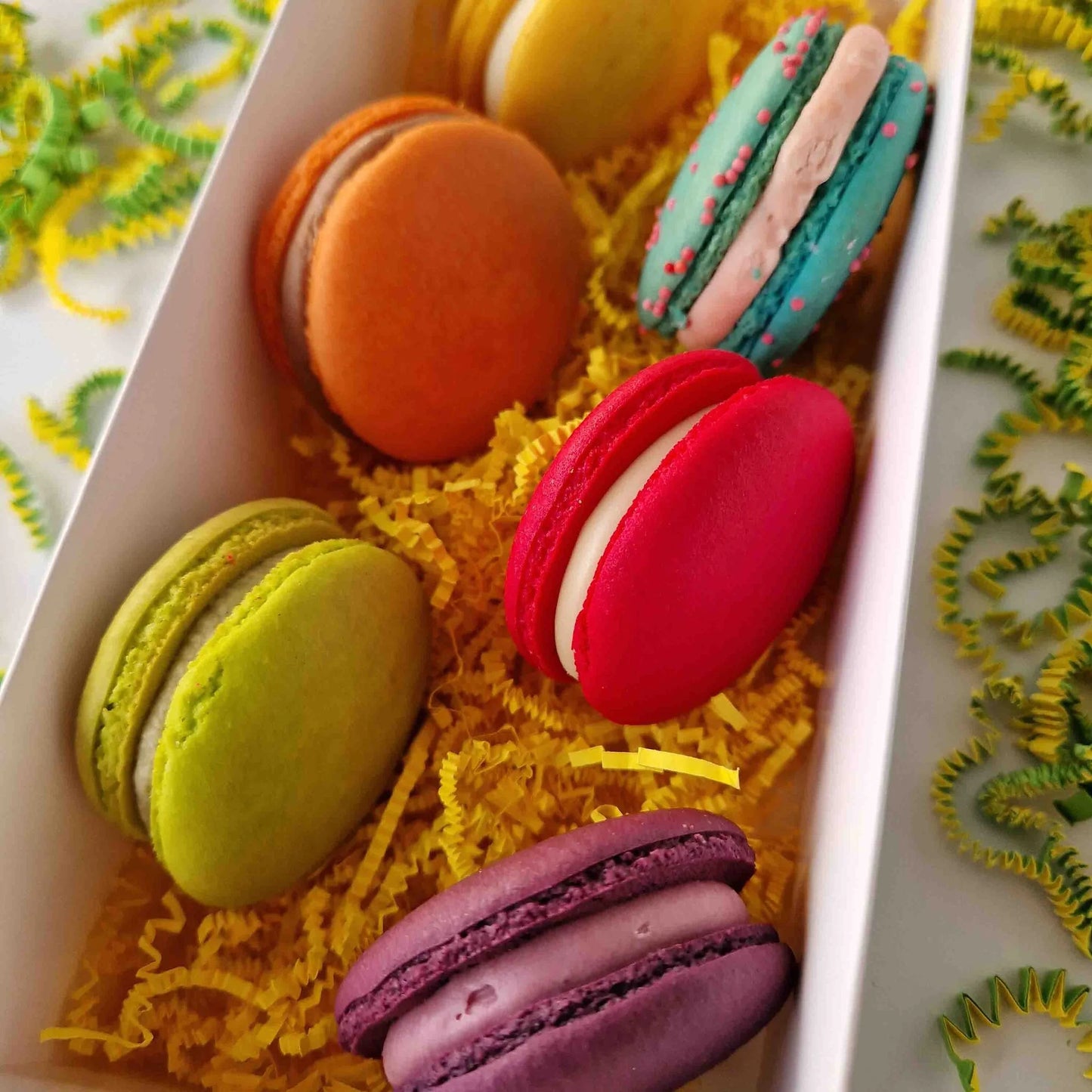 Opvulmateriaal fijn - geel (1 kg) - Cupcakedozen.nl