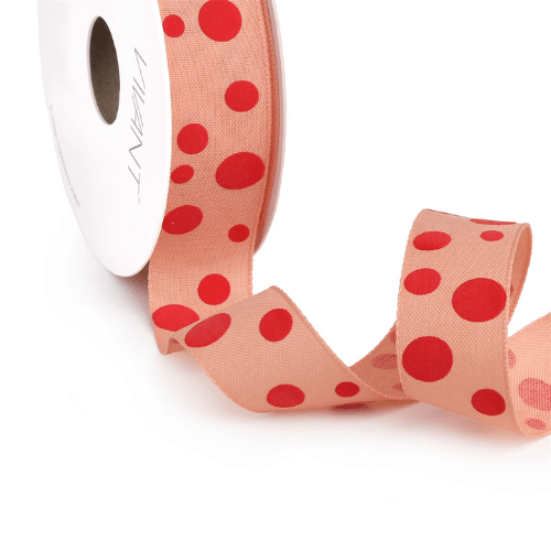 Rol zalmroze lint met rode stippen